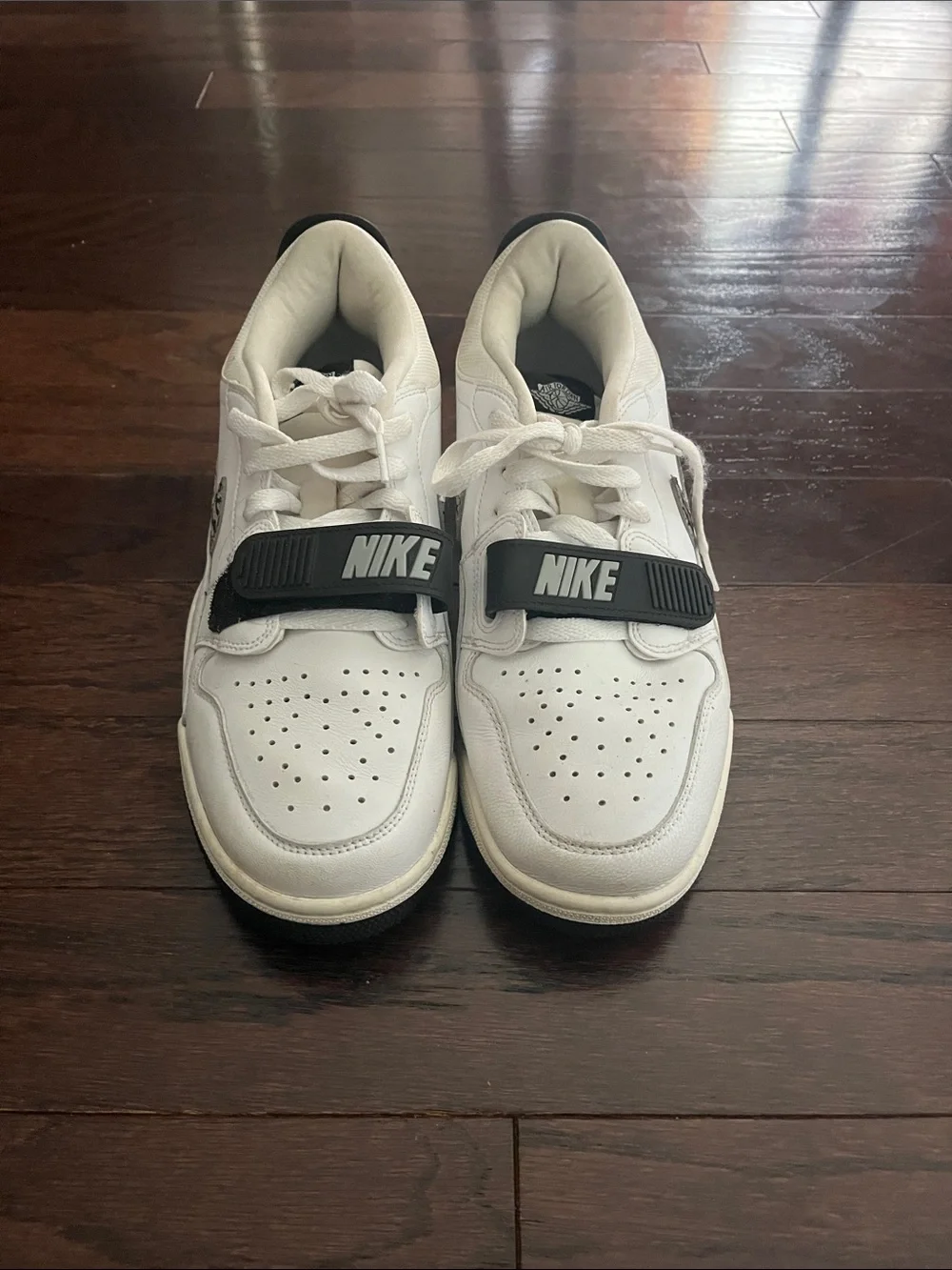 Nike White Low-Top Sneakers with Black Strap Accents